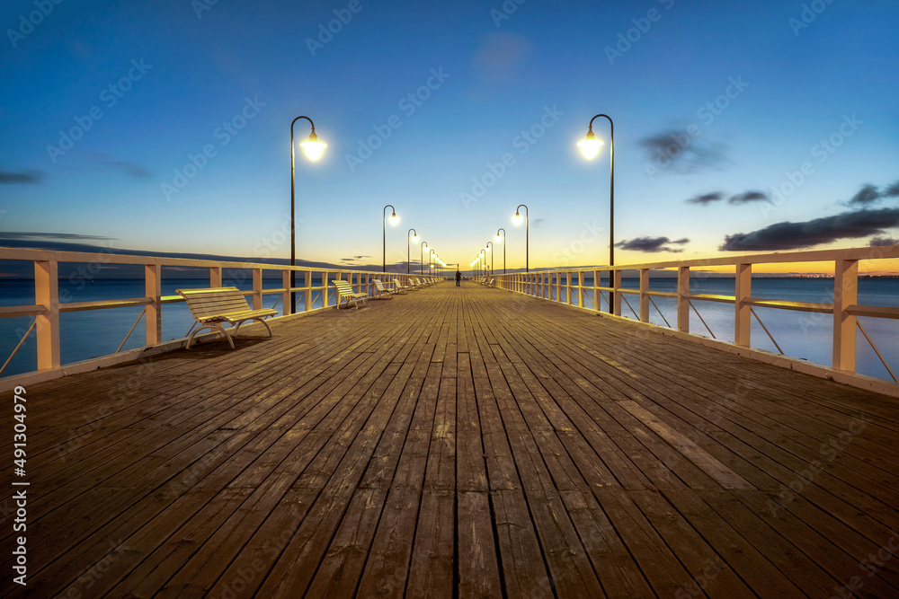 view of the pier before sunrise - Baltic Sea, city of Gdynia, Poland	