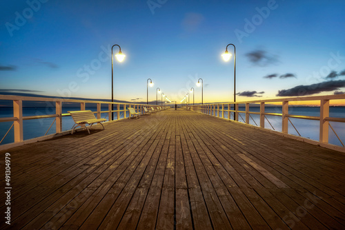 view of the pier before sunrise - Baltic Sea, city of Gdynia, Poland 