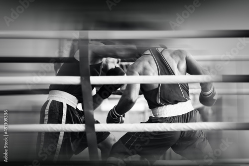 Set of sports black-white background. Silhouettes of boxers in the ring. Restro style and photo film noise.