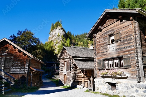 Typical wooden houses Sankt Martin, Walser settlement, in Calfeisental. Graubuenden, Switzerland. photo