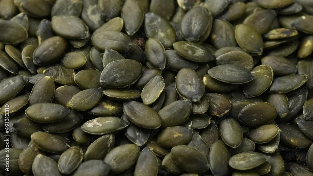 Raw Organic Pumpkin Seeds. Healthy Vegetarian, Vegan Food. Rotating video Raw Organic Pumpkin Seeds. Healthy Vegetarian, Vegan Food. Rotating video