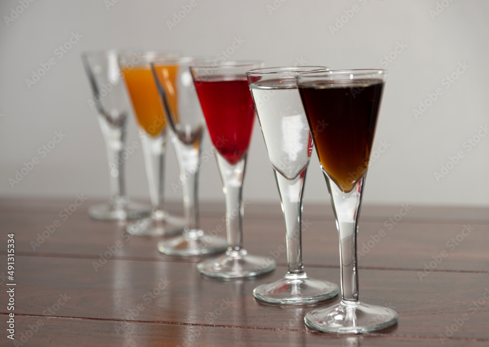 Coctail alcohol drinks on wooden brown table Coctail alcohol drinks on wooden brown table