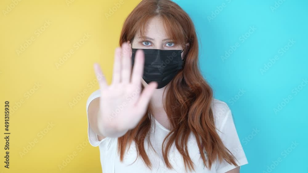 A beautiful red-haired Ukrainian woman says stop no more war A beautiful red-haired Ukrainian woman says stop no more war