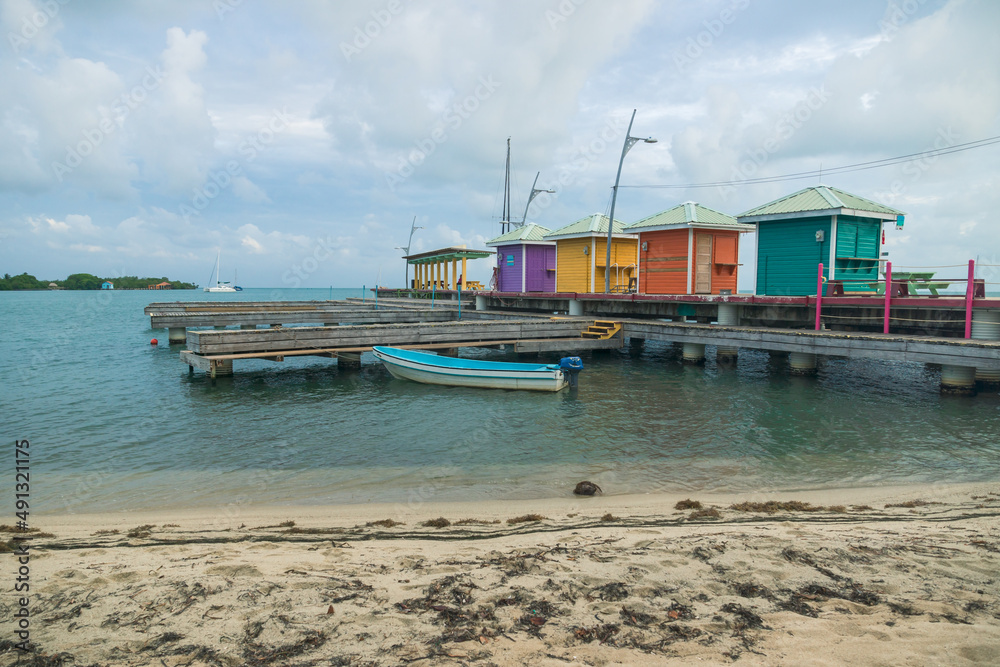 Colorful pier at the harbor of Placencia, Belize