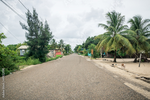 Calm main street through local village in Hopkins, Belize photo