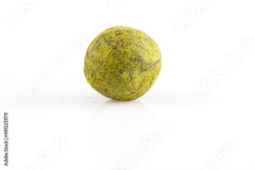 Chocolate candy truffle green color isolated on a white background. Full depth of field. Close-up.