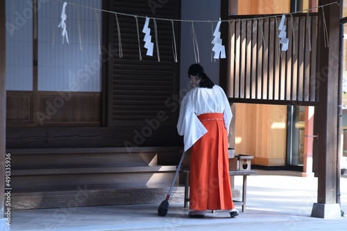 A scene of a priest at a Japanese shrine. 