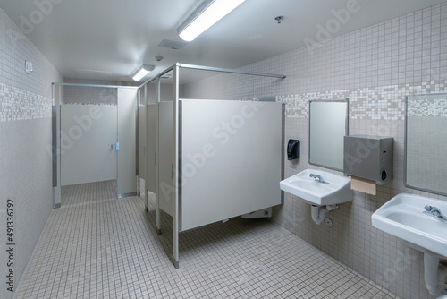 Modern interior bathroom, sink, stall, door