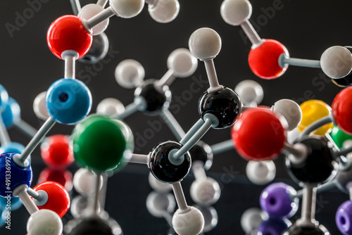Molecular model against black background photo