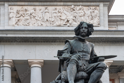Velazquez statue on the main facade of the Prado Museum in Madrid, Spain. photo