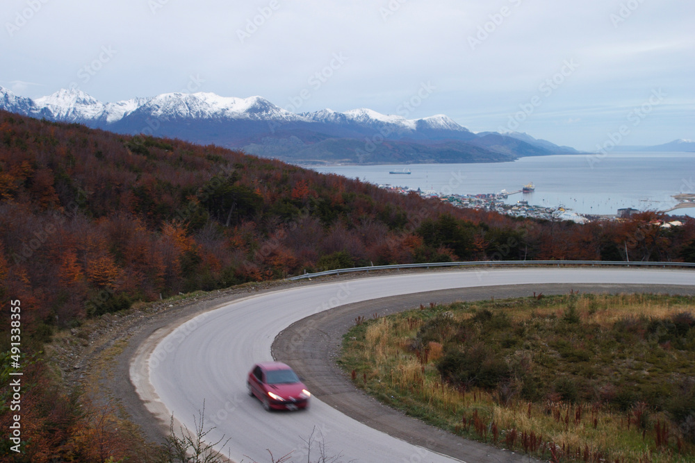 Argentina, Ushuaia, Car on winding road Argentina, Ushuaia, Car on winding road