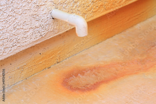 AC condensate drain pipe on the floor