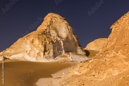 Rock formations of El Aqabat (Agabat) valley in the White Desert, Egypt photo