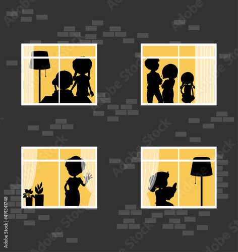 Night windows building with people silhouettes