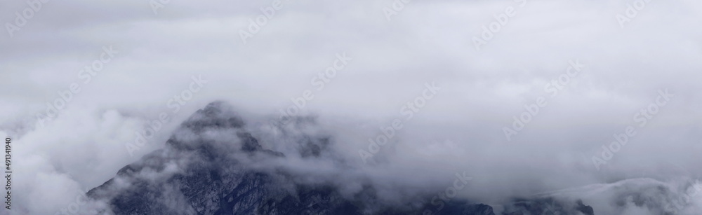 Mountain Peak Obscured By Clouds