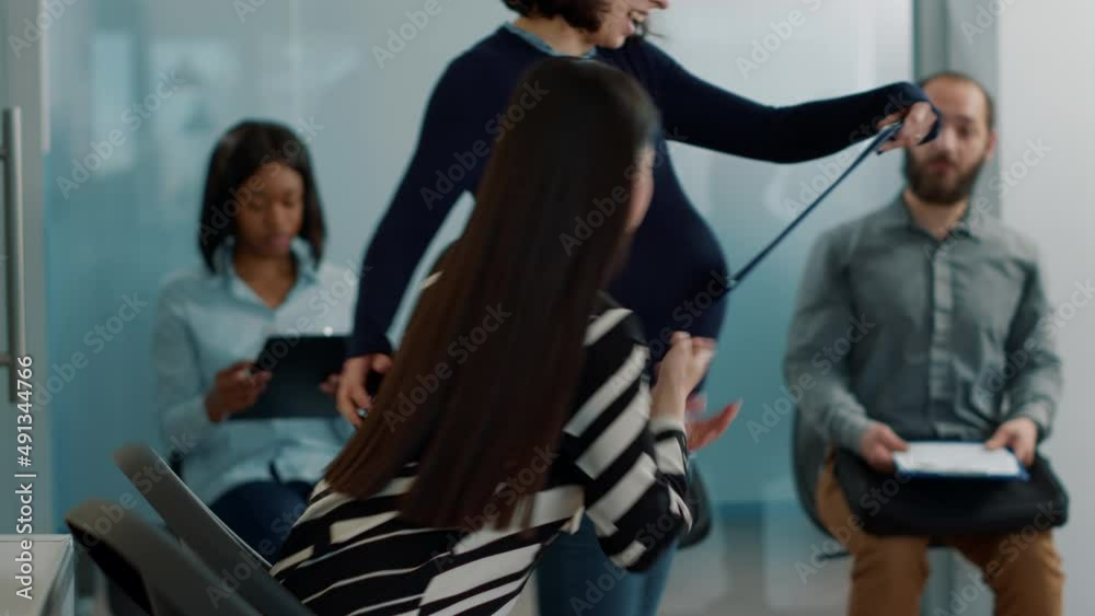 Pregnant worker inviting female applicant to attend job interview with HR team in company office. Candidate and employee joining employment meeting, having cv information files. Pregnant worker inviting female applicant to attend job interview with HR team in company office. Candidate and employee joining employment meeting, having cv information files.