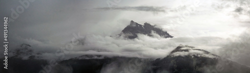 Fototapeta Naklejka Na Ścianę i Meble -  Mountain Obscured By Clouds