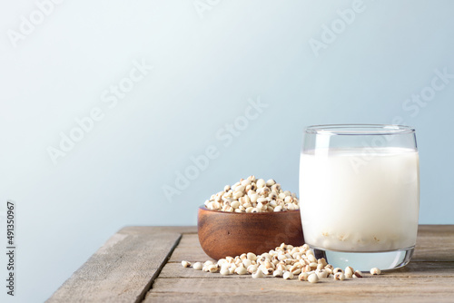 Job's tears cereal drink on wooden table. photo