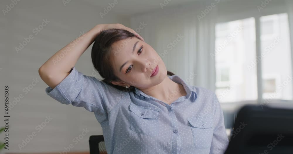 Asia people young woman worker work at home job video call telemedicine online clinic app for workforce care meet chat or tele consult to doctor remote advice teach to relax stiff neck or wrist pain. Asia people young woman worker work at home job video call telemedicine online clinic app for workforce care meet chat or tele consult to doctor remote advice teach to relax stiff neck or wrist pain.