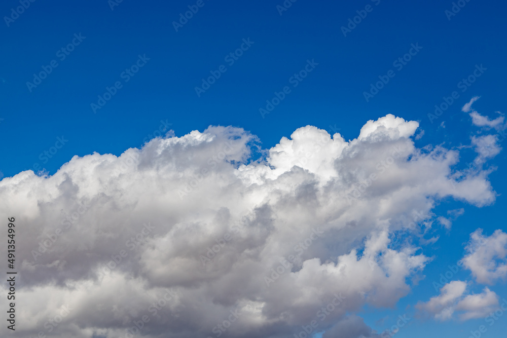 thick white cummulus clouds on a sunny day against a bright blue sky.
absorbent cotton clouds indicating bad weather. blue background on a sunny day. thick white cummulus clouds on a sunny day against a bright blue sky.
absorbent cotton clouds indicating bad weather. blue background on a sunny day.