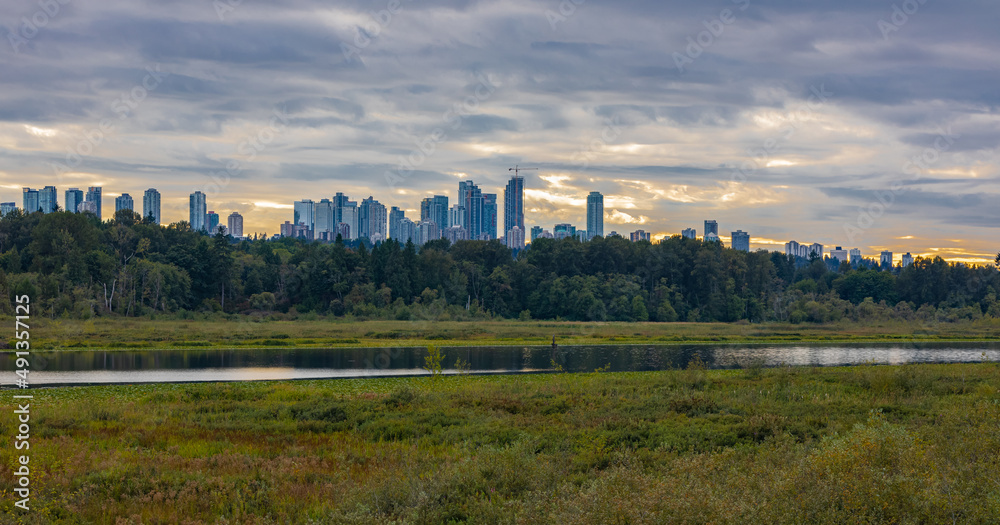 Burnaby, Vancouver BC, Canada. Beautiful View of a modern city in a stormy and rainy day. Cityscape Buildings