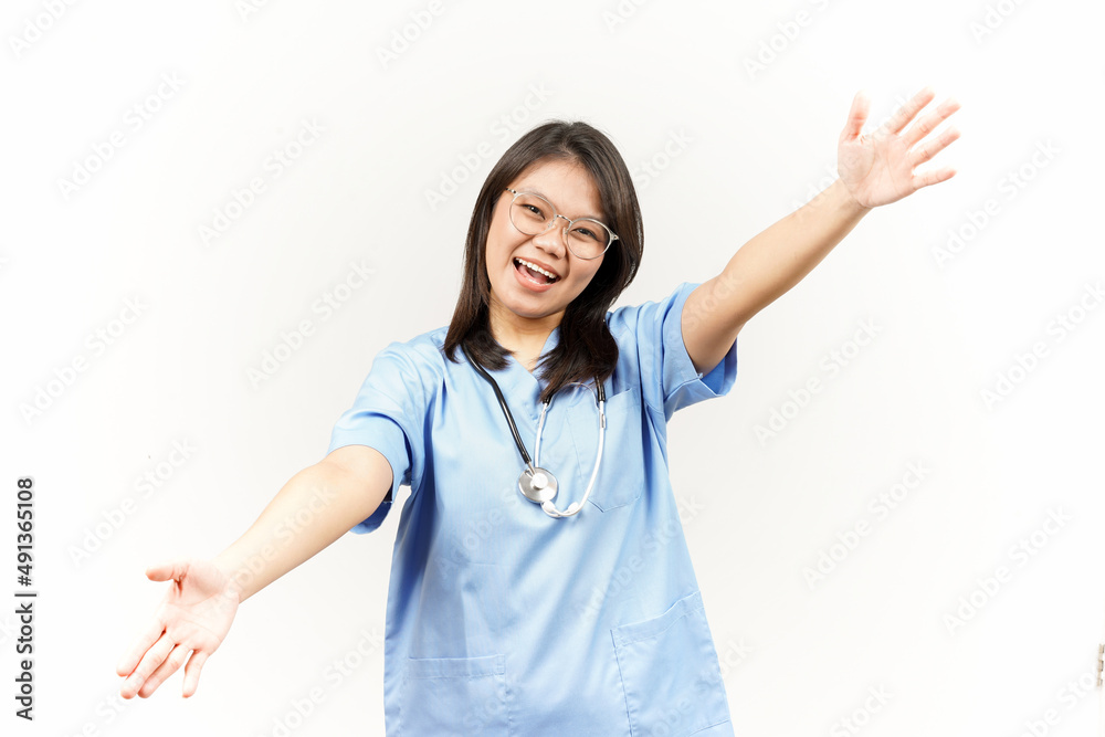 Offering Hug Of Asian Young Doctor Isolated On White Background Offering Hug Of Asian Young Doctor Isolated On White Background