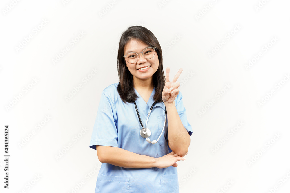 Showing Peace Sign Of Asian Young Doctor Isolated On White Background Showing Peace Sign Of Asian Young Doctor Isolated On White Background