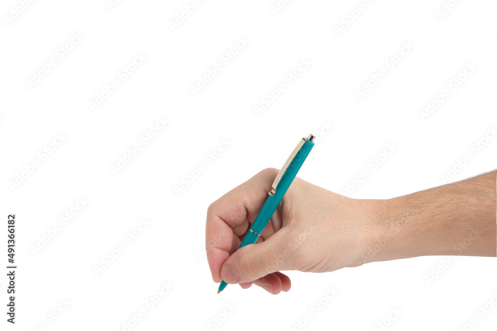 Hand with green ballpoint pen while writing white background. Hand with green ballpoint pen while writing white background.