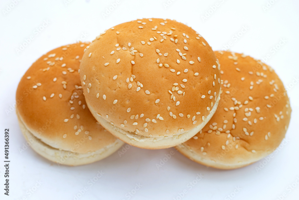 Hamburger buns with sesame on white background.