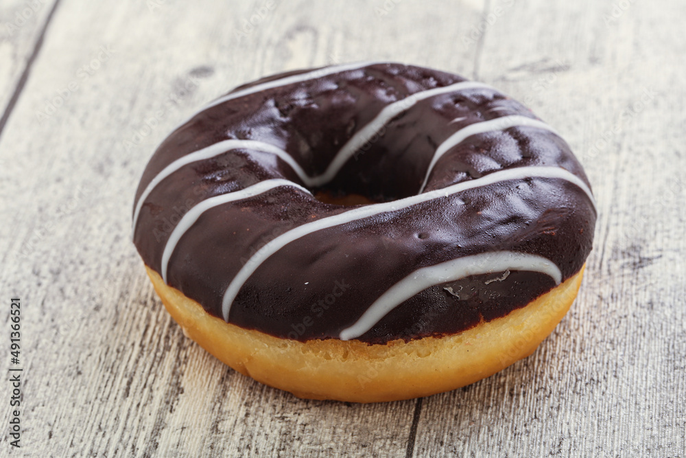 Glazed sweet tasty chocolate donut Glazed sweet tasty chocolate donut