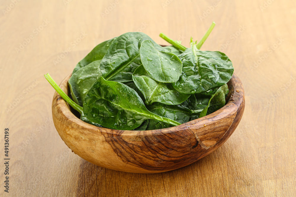 Fresh green spinach leaves in the bowl Fresh green spinach leaves in the bowl