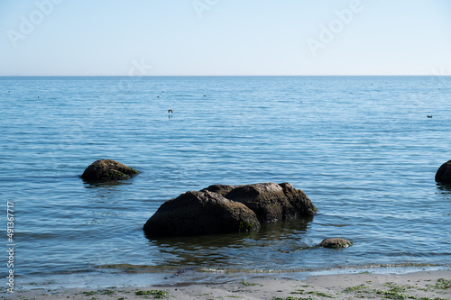 Ocean scene with rocks in the foreground