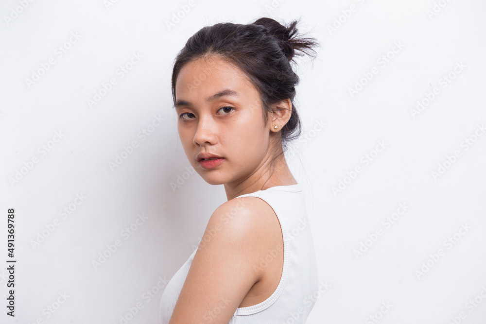 portrait of beautiful young asian woman with clean and fresh skin isolated on white background
portrait of beautiful young asian woman with clean and fresh skin isolated on white background
