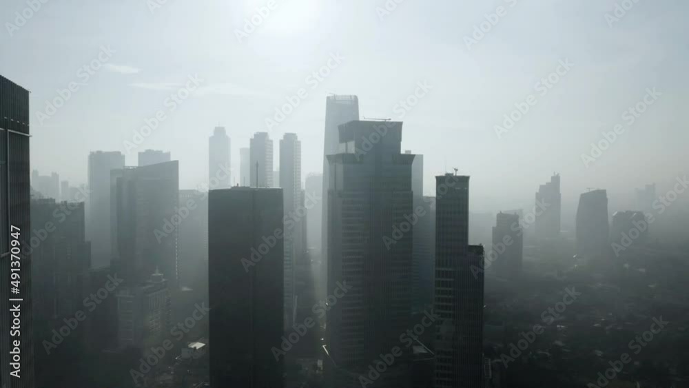 Drone view of dense air pollution smoke in Jakarta Drone view of dense air pollution smoke in Jakarta