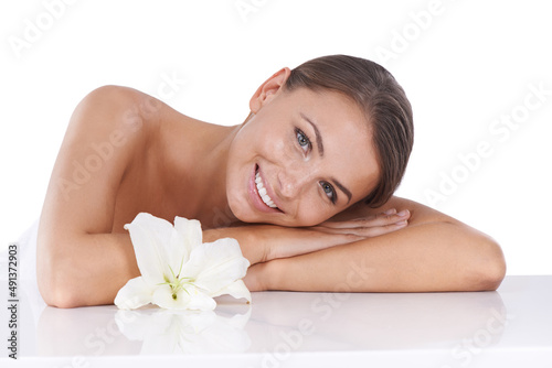 Her radiant beauty is the product of great skincare. Cropped shot of a beautiful young woman isolated on white.