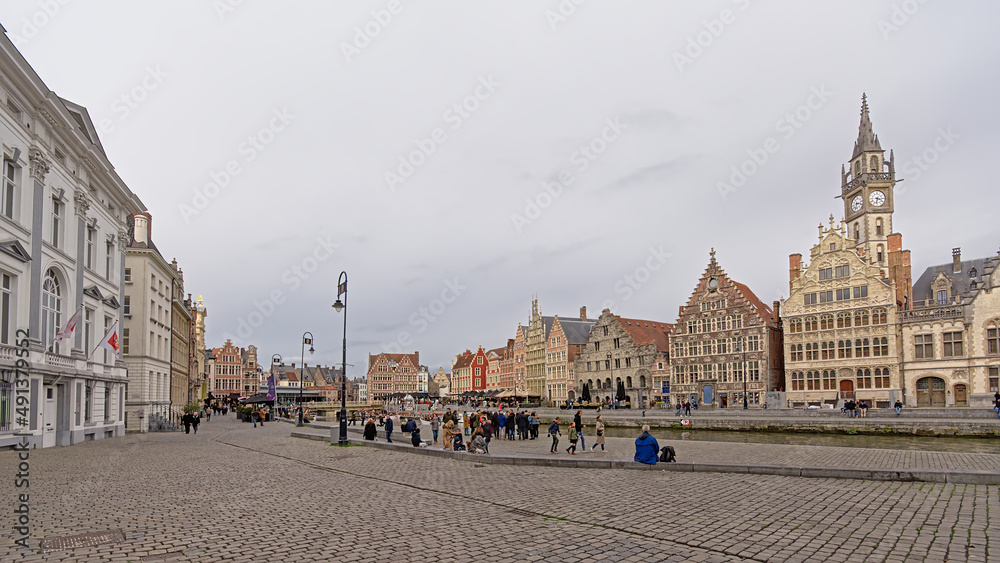 Graslei quay with medieval guildhouses along river Lys in Ghent, Flanders, Belgium