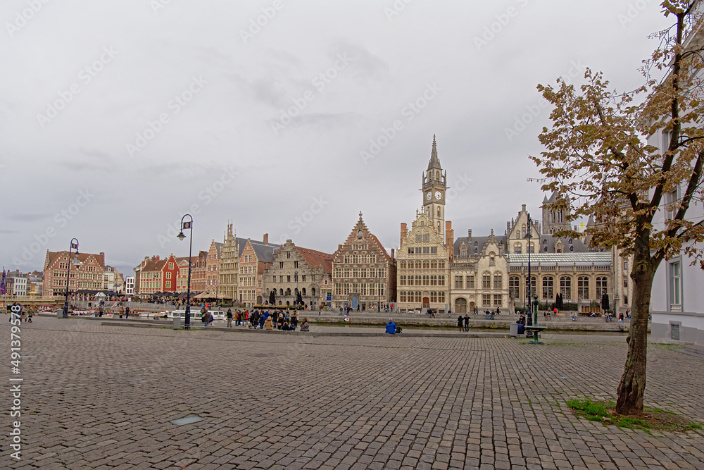 Graslei quay with medieval guildhouses along river Lys in Ghent, Flanders, Belgium