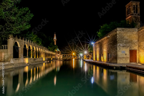 a reflection image of a historical building taken in the night with a long exposure