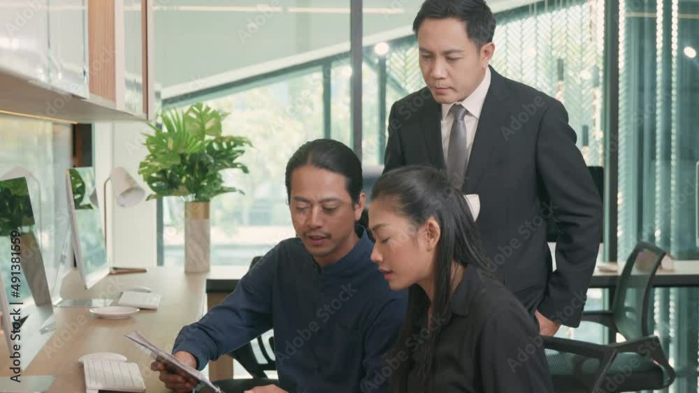 Three business people having meeting together with boss discussing the charts and graphs showing the results, Asian business teamwork talking and analysis budget cost of their success on desk office Three business people having meeting together with boss discussing the charts and graphs showing the results, Asian business teamwork talking and analysis budget cost of their success on desk office