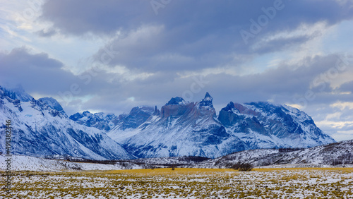Winter in Patagonia: the snow covered Paine Mountain Range in the blue hour just after sunset