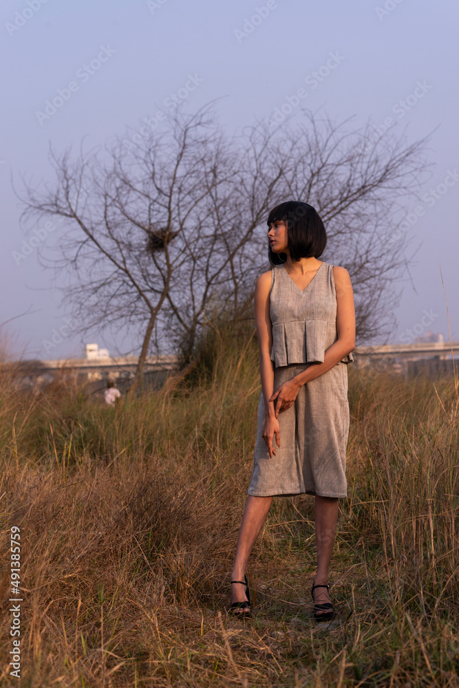 Beautiful Young Fashion model posing outdoor  in casual garments 