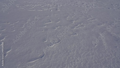 movement of snow particles on a white snow fancy cover