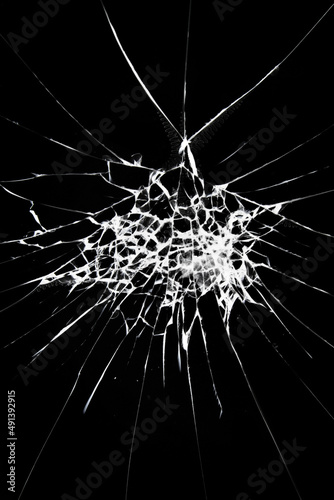 Cracked glass on a black background.