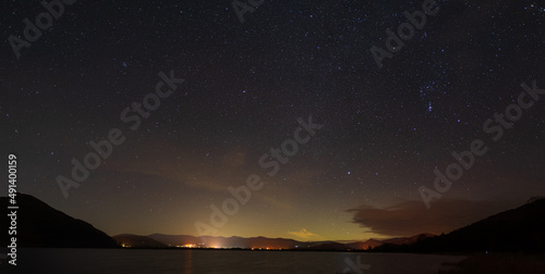 A panoramic view of the night sky over Bassenthwaite in the English lake district