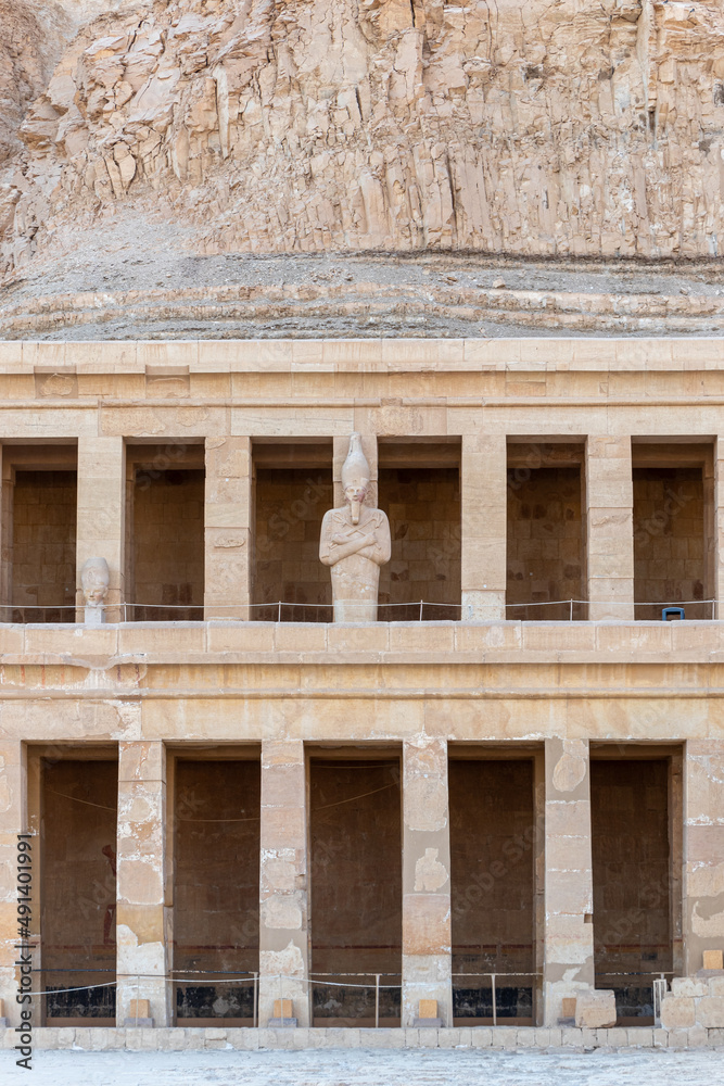 Naklejka premium A sculpture of Pharaoh at the Mortuary temple of Hatshepsut near the Egyptian city of Luxor