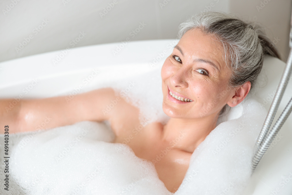 Happy woman resting in the spa after work Happy woman resting in the spa after work