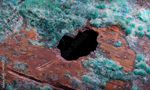 Quadro su tela Close-up of pitting corrosion on a copper pipe causing a water leak
