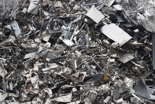 Aluminum and ferrous materials scrap ready for recycling. Full frame, background and texture. photo