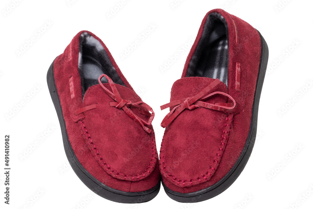Slippers isolated. Close-up of a pair of female red warm and soft cosy terry house slippers isolated on white background. Womans shoes. Macro. Slippers isolated. Close-up of a pair of female red warm and soft cosy terry house slippers isolated on white background. Womans shoes. Macro.