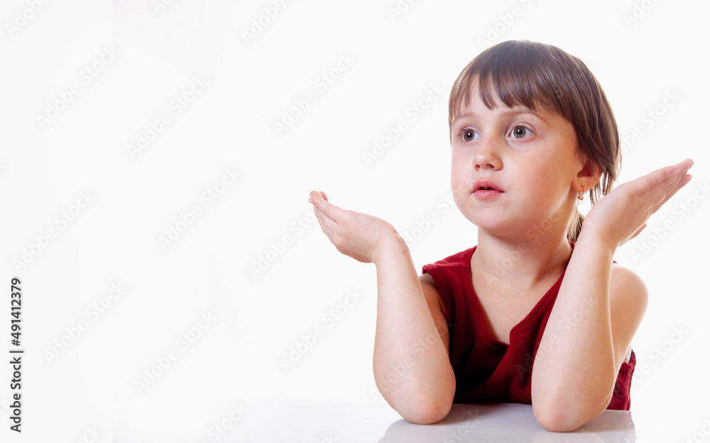 Portrait of little cute child girl confused. Gestures, body language, facial expressions and depression concept. Free space for text. Portrait of little cute child girl confused. Gestures, body language, facial expressions and depression concept. Free space for text.